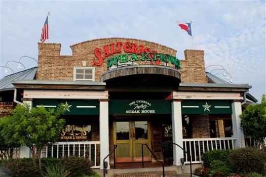 Saltgrass Steakhouse is located next to I-35 near Toys-R-Us. 