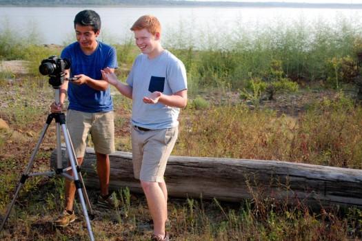 Junior Alex Goff (junior) directs as Coram Deo Academy sophomore Fernando Echeverria (left) films for their company. 