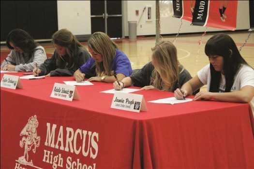 Varsity girls soccer commit to colleges
