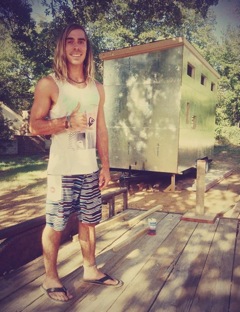 Former substitute Joel Weber stands in front of his future home. He started his project this summer. 