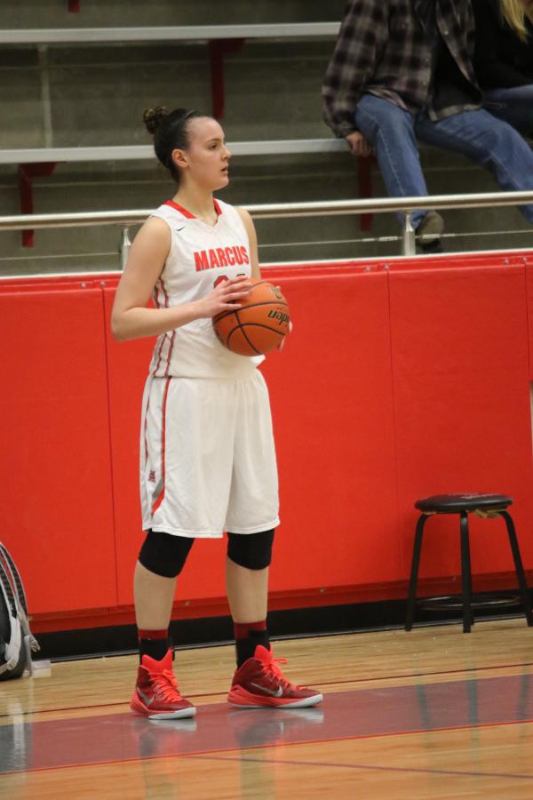 Senior Taylor Roof inbounds the ball in a game against Plano Easton Jan. 30. The Marauders won the game 69-57. 