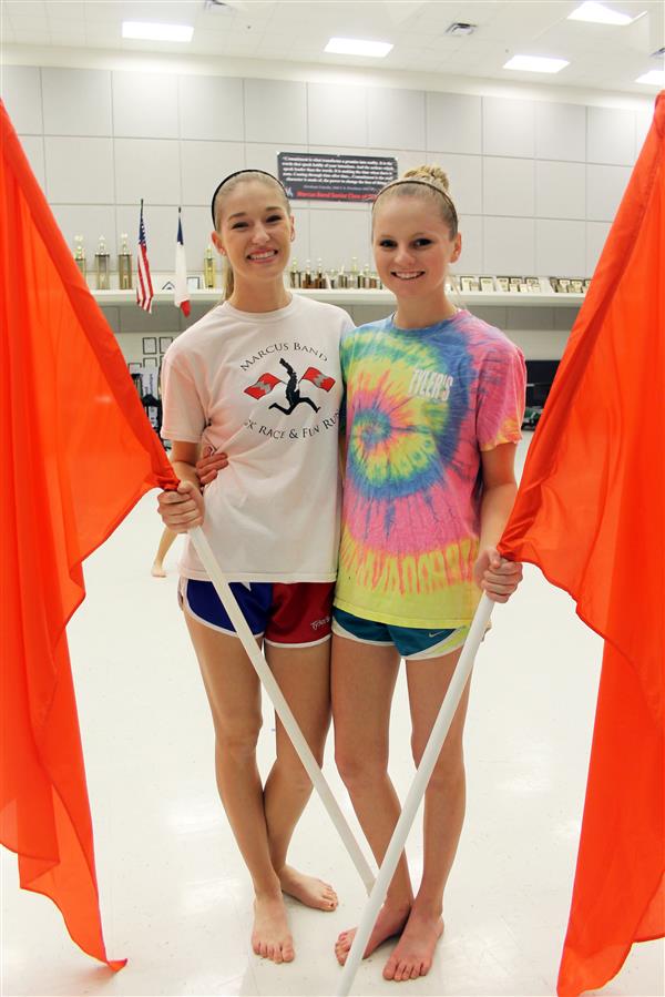 Seniors Jenny Hollowell (right) and Emily Plummer (left) were in colorguard for all four years of high school. 