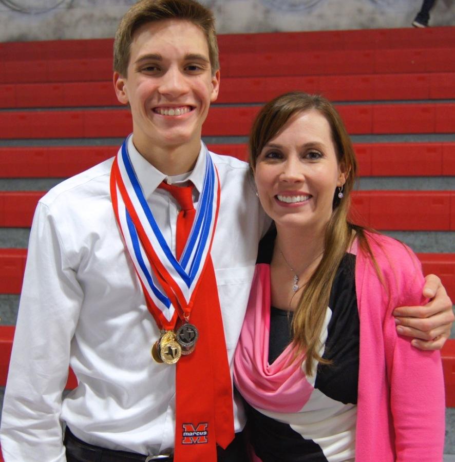 Nick Chase and mother Tamara Castaneda celebrate after winning a total score of 7500 points in a regional ACDEC competition. 