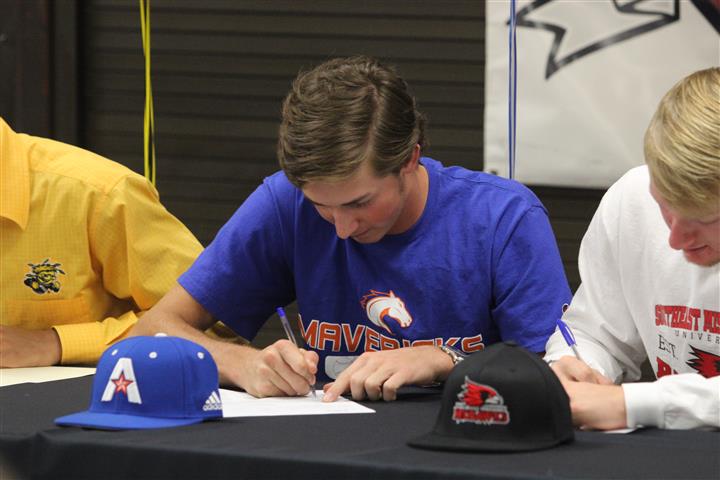 Baseball players sign for scholarships