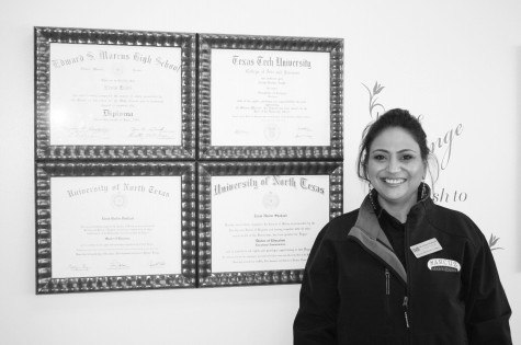 Assistant Principal Dr. Erum Shahzad proudly stands next to her four diplomas. In 2012, she achieved her Doctor of Education, Superintendency and Educational System Administration from UNT.