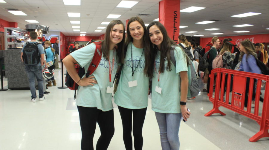 Sophomores Abby Welke, Ellie Conley, and Isabella Fortino take part in Twin Day for Battle of the Mound.