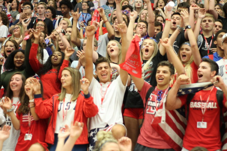 Students stand front row showing off their patriotic spirit wear. 