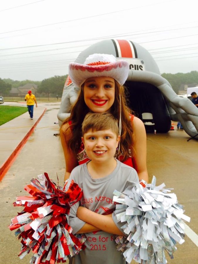 On senior Peyton Mowl’s last birthday, the Marquettes held a 5k marathon and dressed in their full uniforms to send off the runners. Peyton’s family was in the crowd cheering with her. Jacob loved to watch his sister perform in the Marquettes.