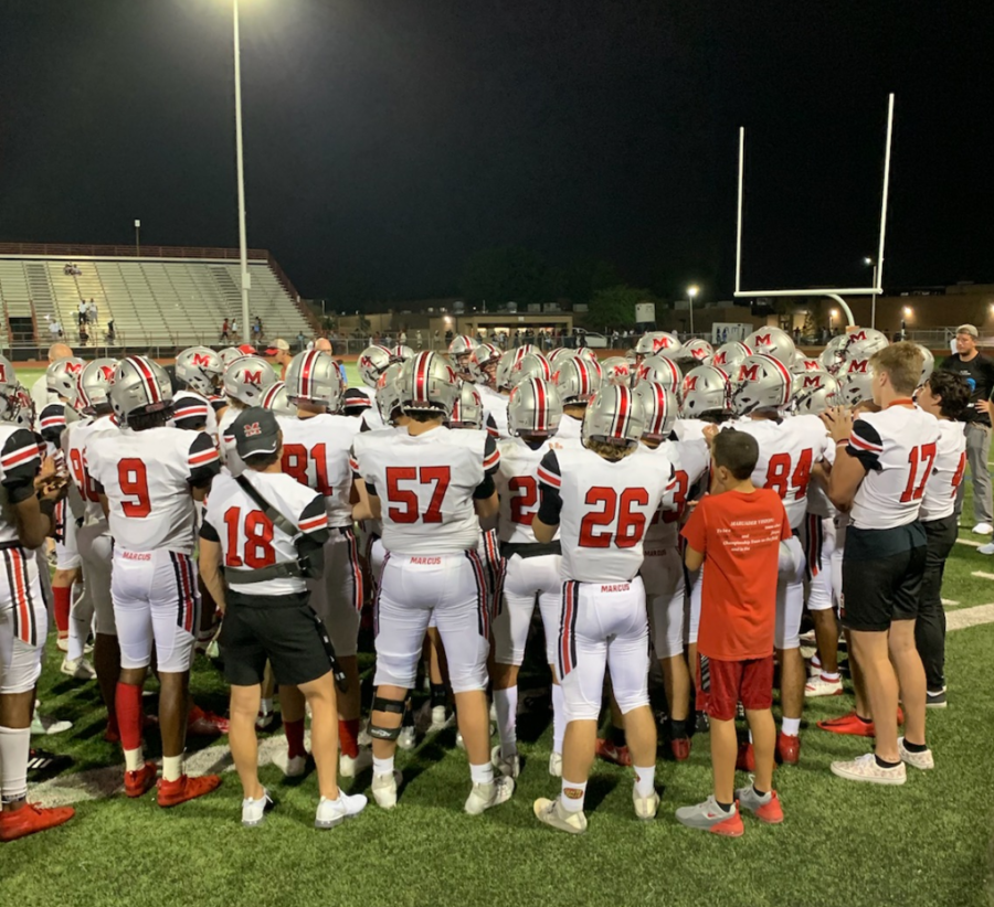 The Marauders huddled together after their loss to get pumped up for their next game. 