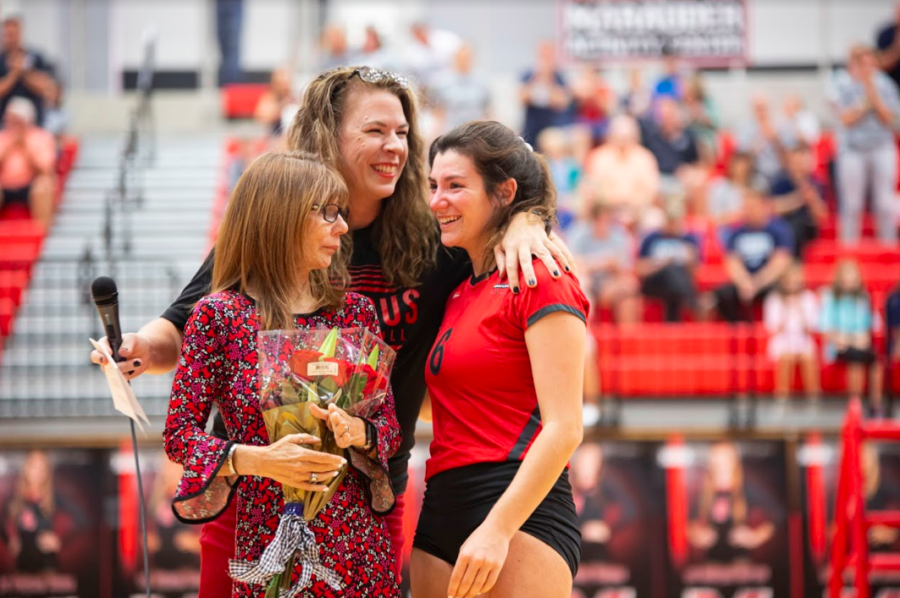 Wendy Smith was presented with the award after her daughter, junior Leila Smith, played in her volleyball game.