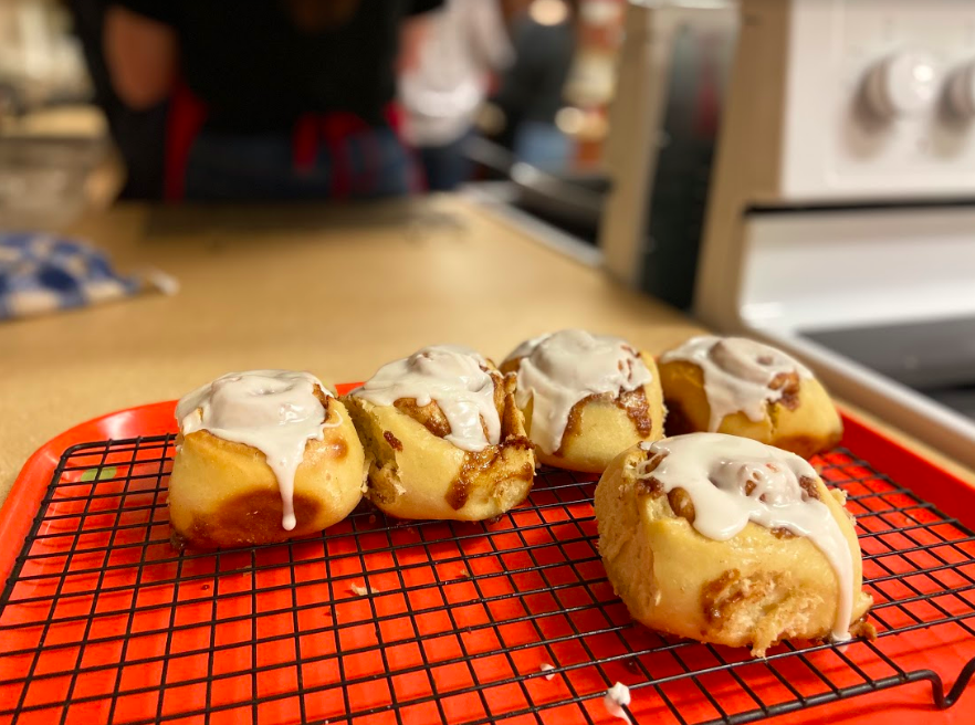 Mrs. Talley’s food science class glazed their cinnamon rolls after taking them out of the oven. This lab lasted three days as they made the dough, cinnamon filling, and glaze all from scratch.