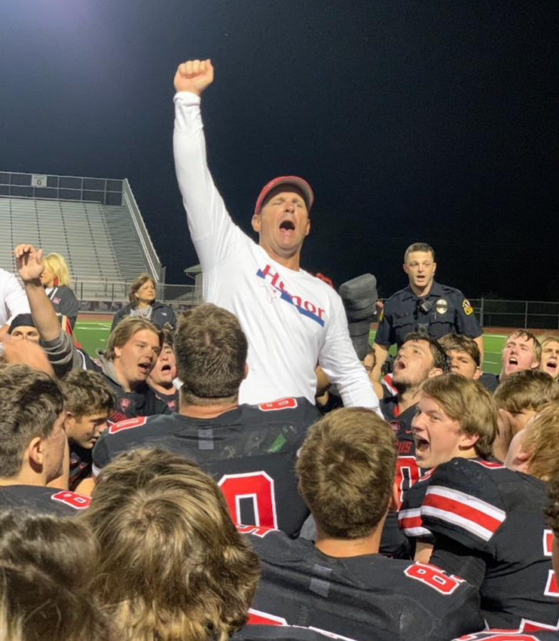 Head coach Kevin Atkinson celebrated with the team after their win against the Coppell Cowboys. Last week, the Marauders beat the Hebron Hawks 24-14. 