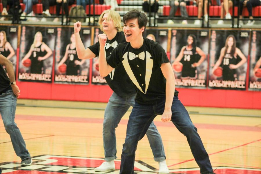 Senior Landon Bradley dances to popular songs with the rest of the Mr. Marcus contestants. 