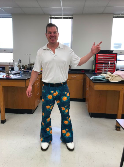 Mr. Hinesly poses in an iconic dance move from the 70’s, which has inspired the outfit he’s wearing for decades day.