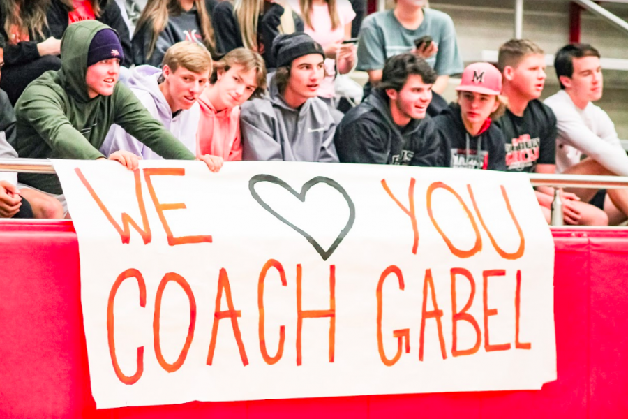 Posters were hung around the school to announce the game and honor golf coach Kerry Gabel. Coaches and members of the boys teams cheered on the girls during their game, and also had a game afterwards to support Gabel. 