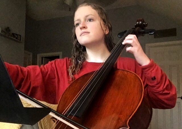 Freshman+Lora+Swindle+plays+the+cello+to+pass+time.+She+is+a+member+of+orchestra.