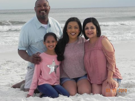 Junior Reya Mosby (second to the right) spends time with her family while on vacation.