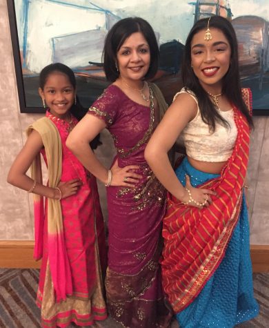 Junior Reya Mosby (right) attends an Indian wedding with her younger sister and her mom.