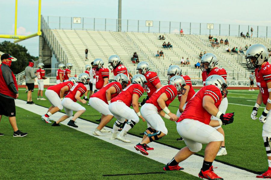 The Marauders warm up 
before their scrimmage against Prosper.