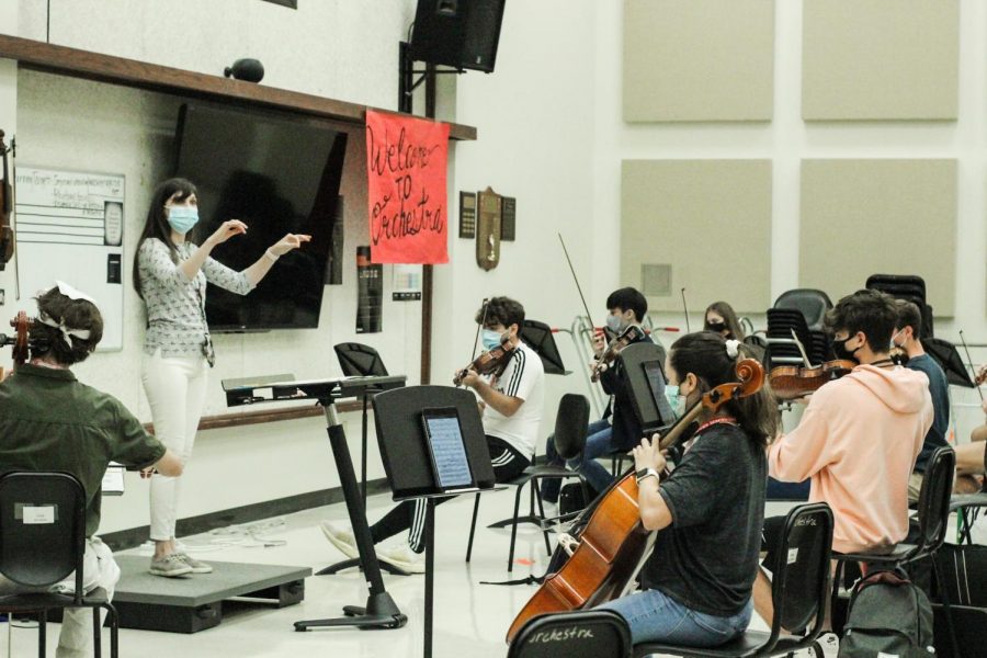 Orchestra Director Allison Washler executing beats and tempos.