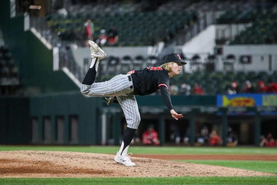 Senior Cade Bradford pitches during the game game against IMG Academy on Feb. 27, which took place on Globe Life Field. The Marauders won 6-5.