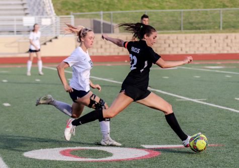 Senior Leah Roulston attempts to score a goal during the game on April 6, which Marcus won 3-0 against the Keller Indians.