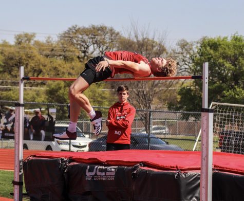 Senior Blake Bradford successfully completes the high jump during the Steve Telaneus Invitational on April 1.