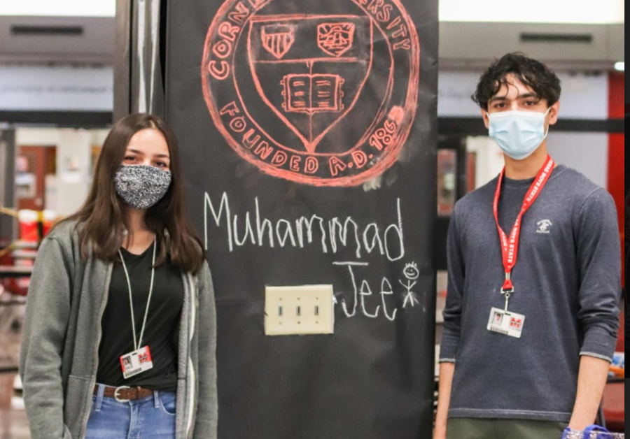 Senior twins Alsa Khan and Muhammad Jee attend the senior signing event in the cafeteria. Alsa has been involved in Student Council, while Muhammad was on the track team.