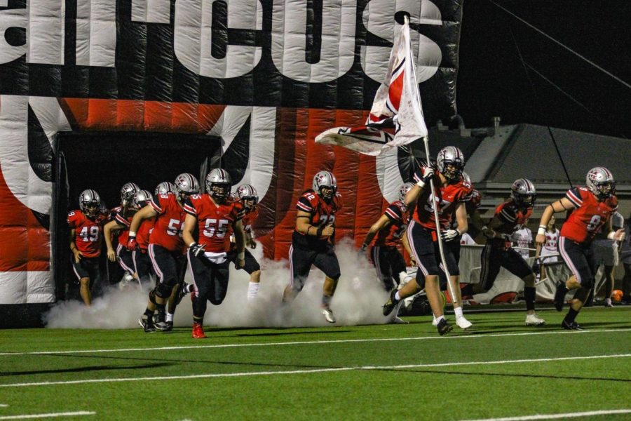 Players emerge onto the field to begin the third quarter.
