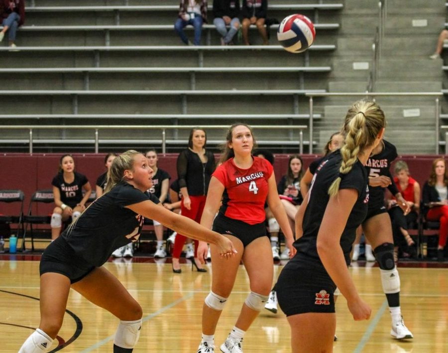 Boyd prepares to hit the ball at the Lewisville game which the team won 3-0.