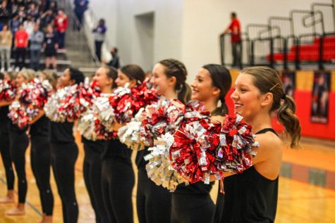 Marquettes line up before the beginning of the pep rally on March 2.