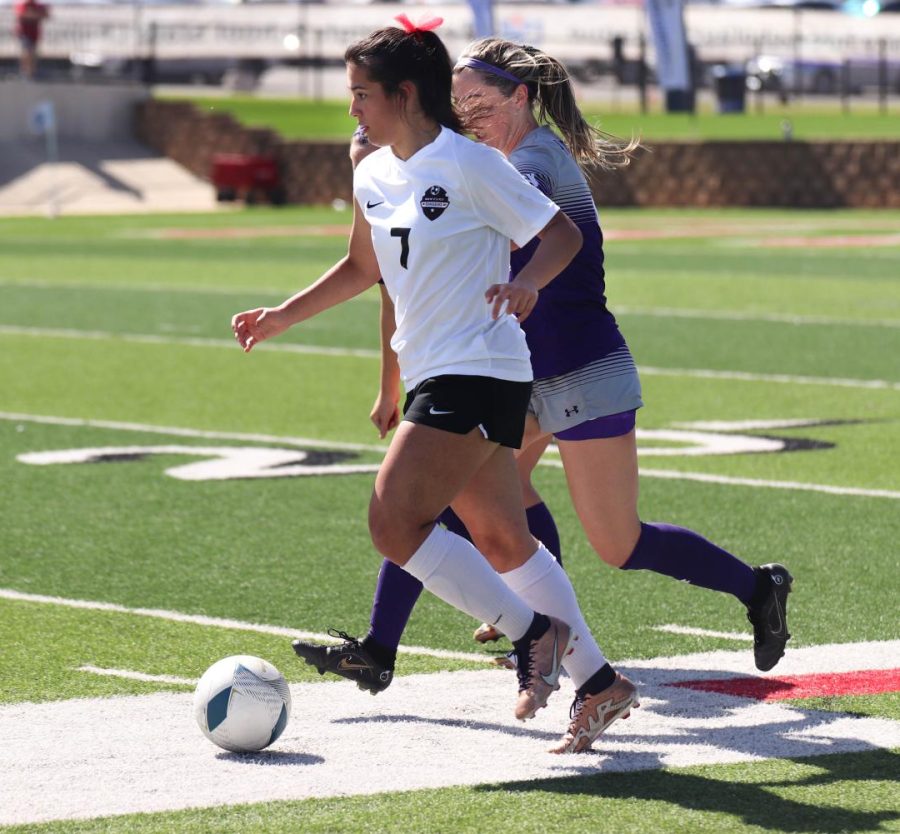 Senior Bella Campos, who received UILs MVP award, speeds down the field to score the winning goal at the state finals.