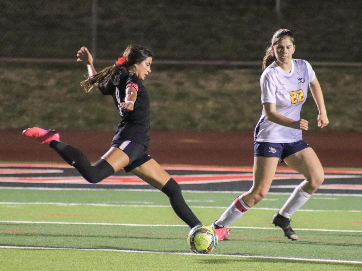 Forward Maddie Hayes, 12, fires a shot on goal during a 6-0 victory over Lamar in the area round of the playoffs at Mustang-Panther Stadium in Grapevine March 25, 2025.