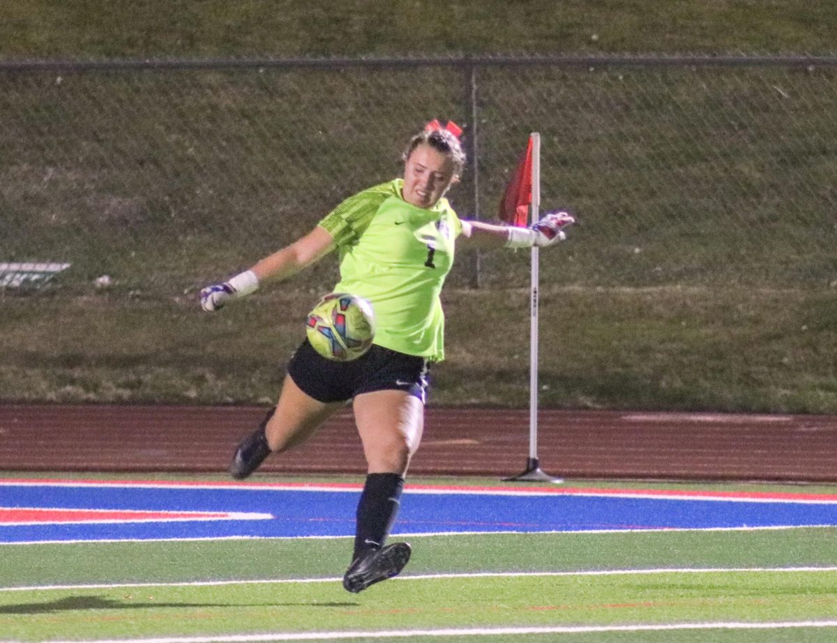 Goalkeeper Aubrey Tipton, 12, punts out of her own goal in a 6-0 victory over Lamar in the area round of the playoffs at Mustang-Panther Stadium in Grapevine March 25, 2025.