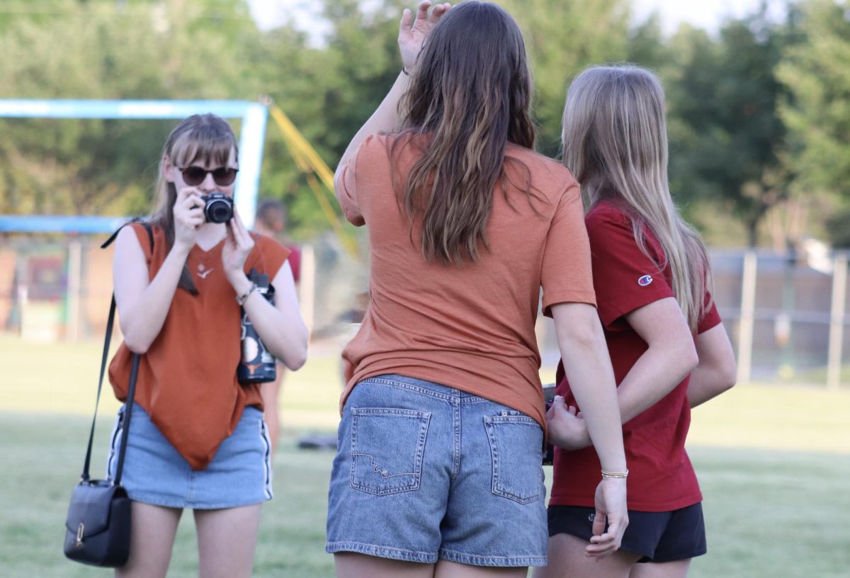 Kate Reynolds and Sara Spencer pose for Katherine Schaeffel at Senior Sunset on April 17, 2025.