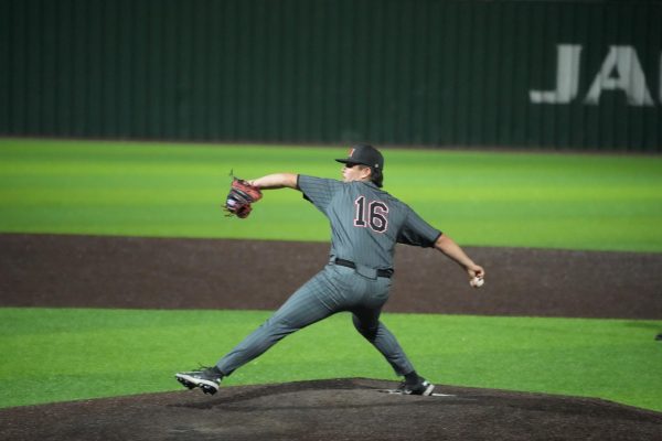 Cesar Bustamante hurls a strike against Flower Mound in district play on April 10, 2026.